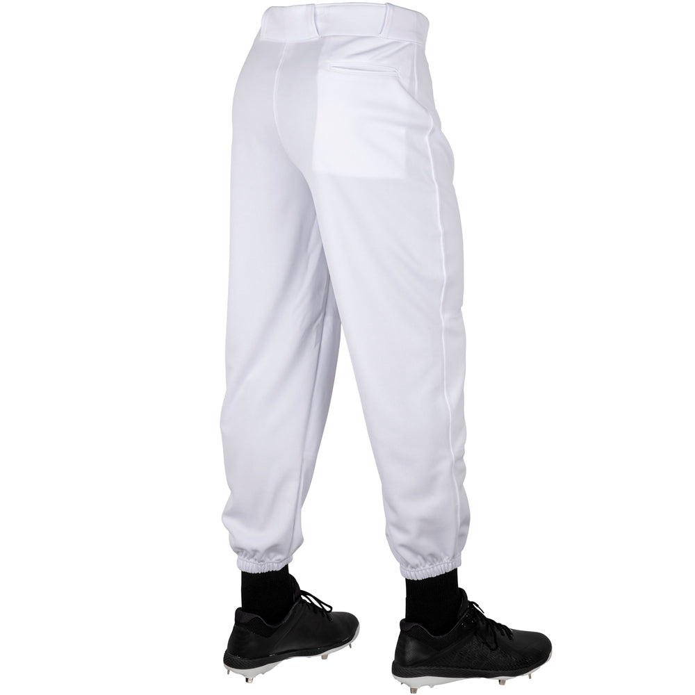 White MVP Classic Baseball Pant worn with black cleats on a white background