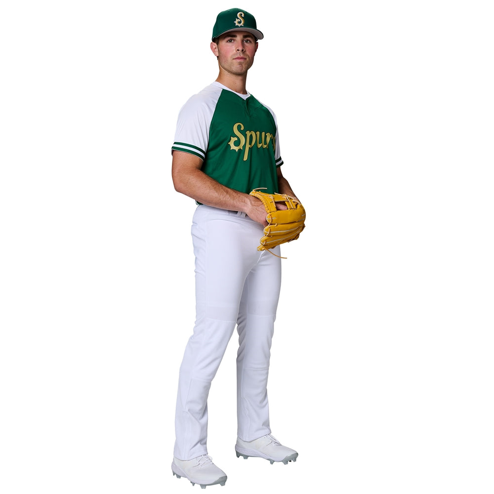 baseball player wearing a green and white baseball uniform with 'Spurs' logo, wearing White Champro Triple Crown 2.0 Open Bottom pants holding a yellow glove on a white background.