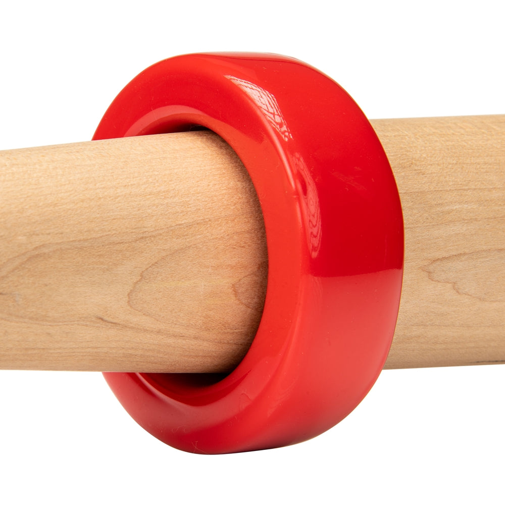 baseball bat with Champro bat weight in red color on white background