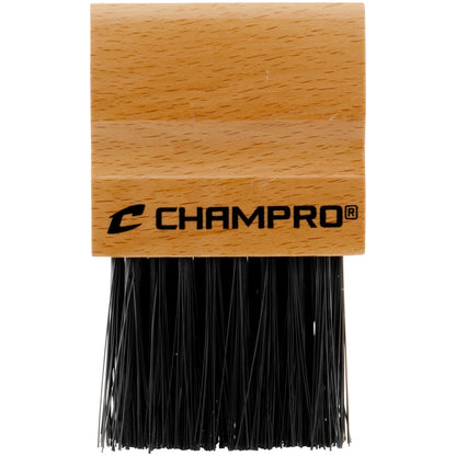 Wooden umpire brush with black bristles and Champro logo on a white background