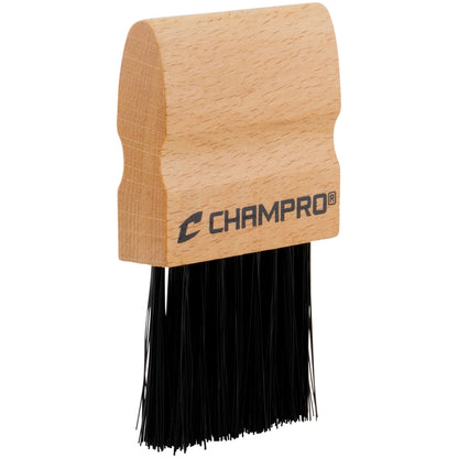 Wooden umpire brush with black bristles and 'Champro' branding on a white background