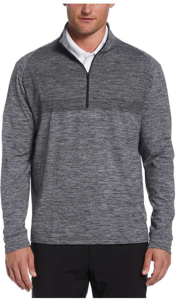 Man wearing a gray Perry Ellis Golf Men’s 1/4 Zip Performance Pullover over a white shirt on a white background