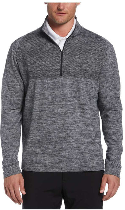 Man wearing a gray Perry Ellis Golf Men’s 1/4 Zip Performance Pullover over a white shirt on a white background