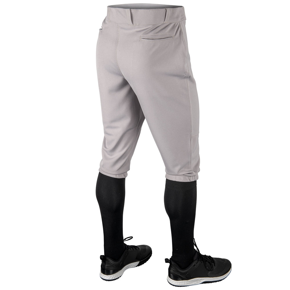 Gray softball Champro MVP Knicker pants with black socks and shoes on a white background