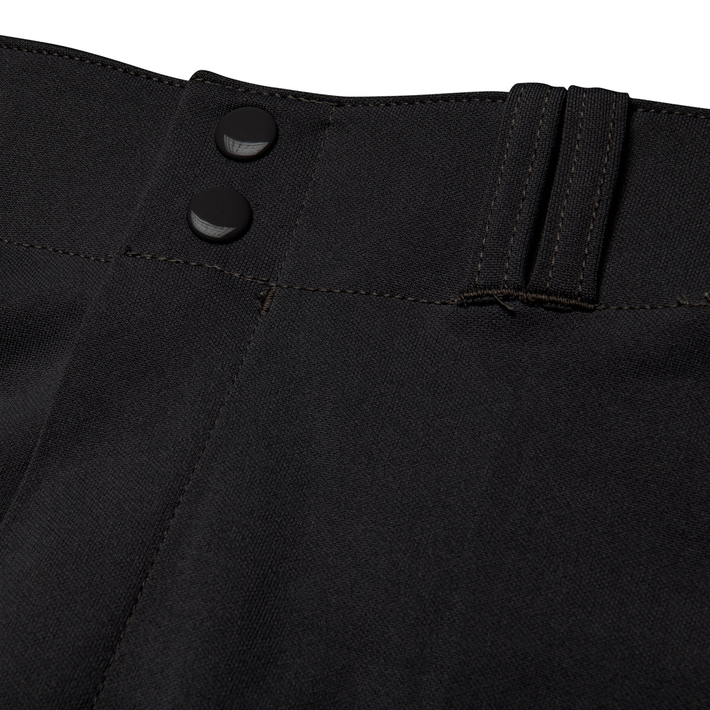 Close-up of black MVP Classic baseball pants with buttons on white background