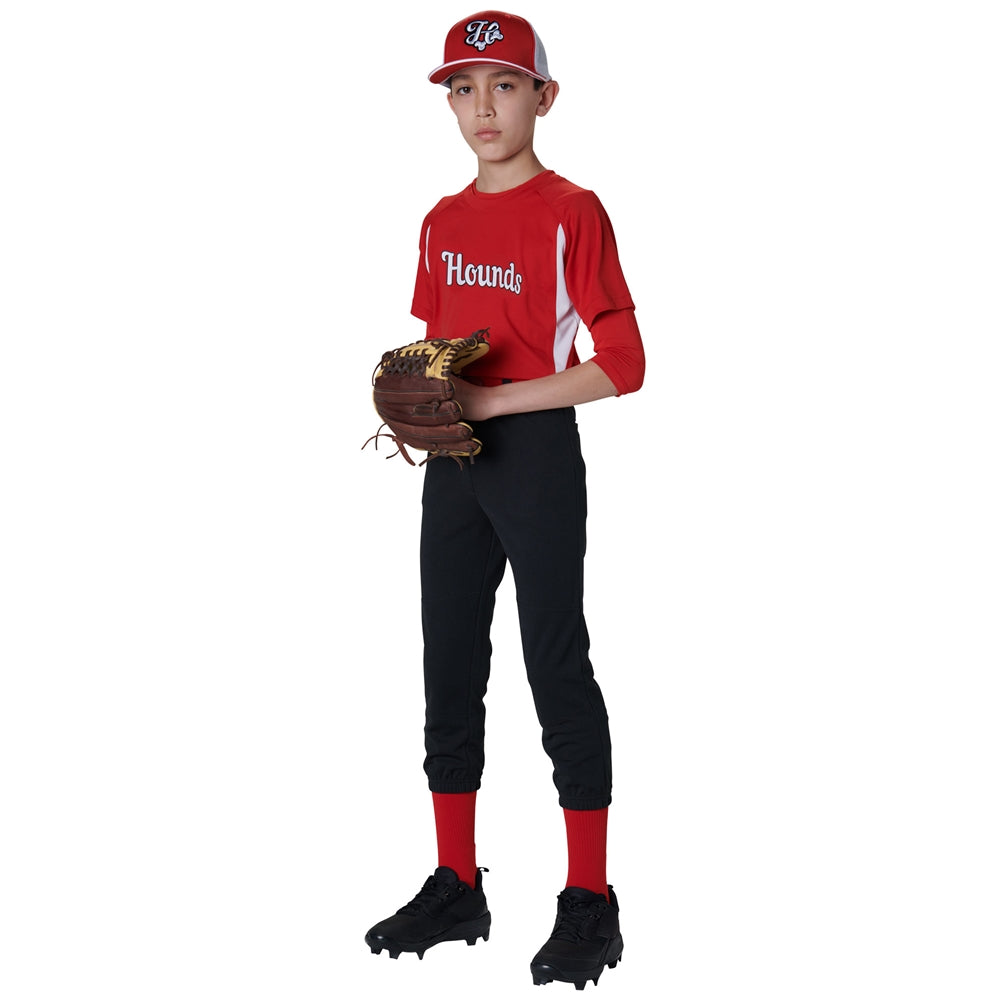 Child wearing a red sports uniform with 'Hounds' and Champro Cycle Pull Up Pant with Belt Loops on a white background