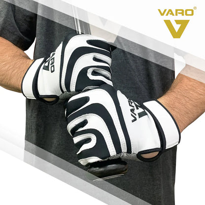 Person wearing black and white Varo padded batting gloves with a clear background